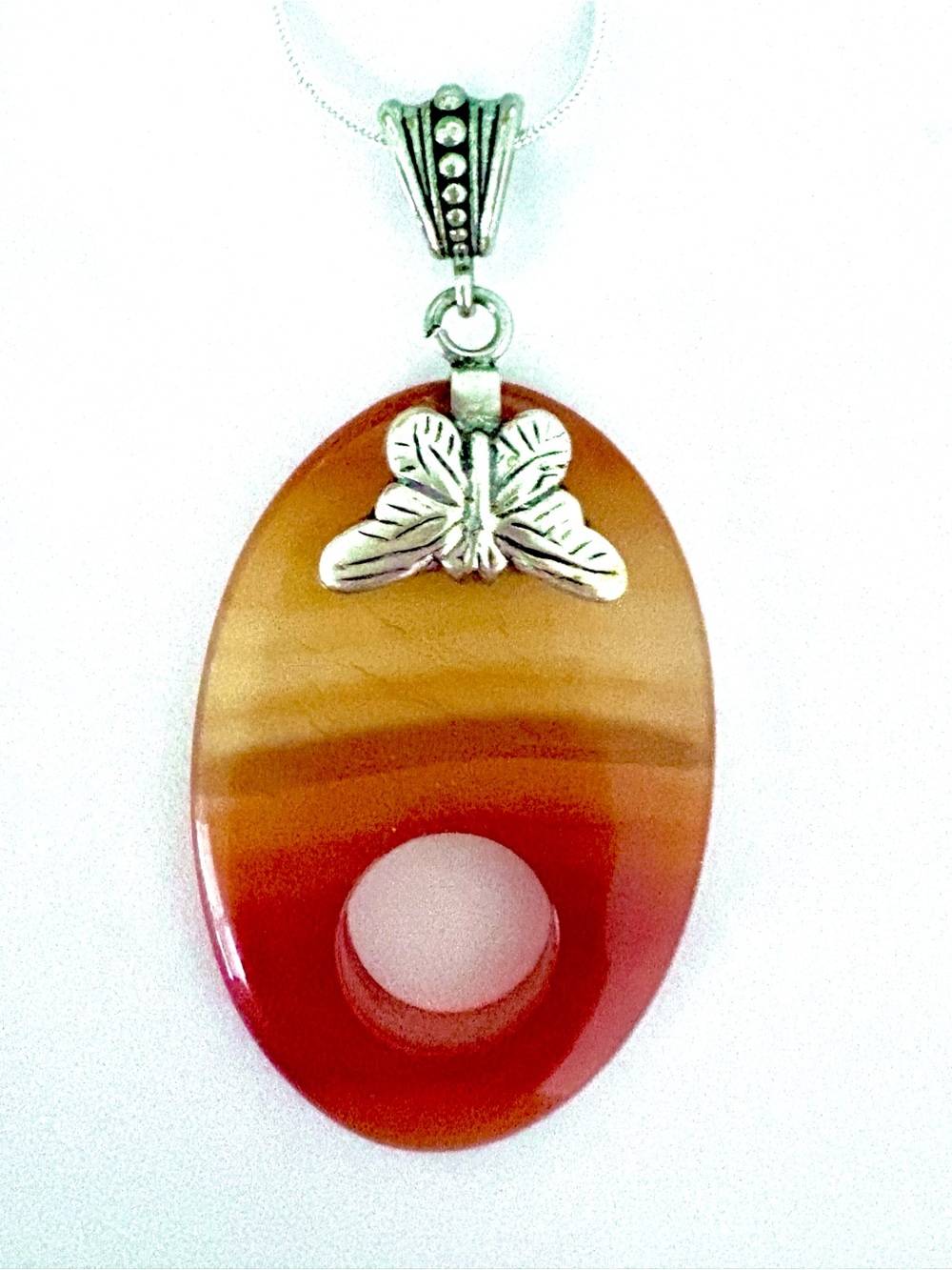 2 1/2 inch, Orange Lace  Agate, pendant , on a silver chain.